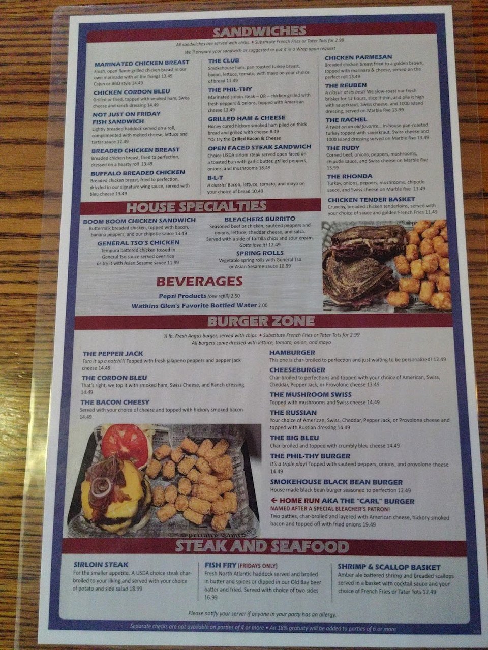 Menu page with appetizers, salads, and sandwiches.